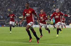 Substitute Rashford breaks Hull resolve with late winner