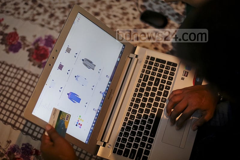A customer making a purchase online through a debit card. Photo: asaduzzaman pramanik
