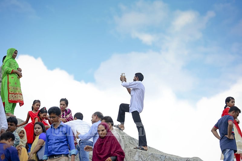 Visitors take photo at DNCC Wonderland in Dhaka's Shyamoli to capture Eid moments a day after the festival on Tuesday. Photo: asaduzzaman pramanik