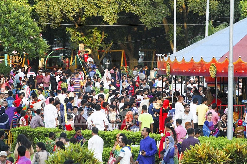 Hundreds crowd for a ride at the Shishu Park on Tuesday after the Eid. Photo: abdul mannan