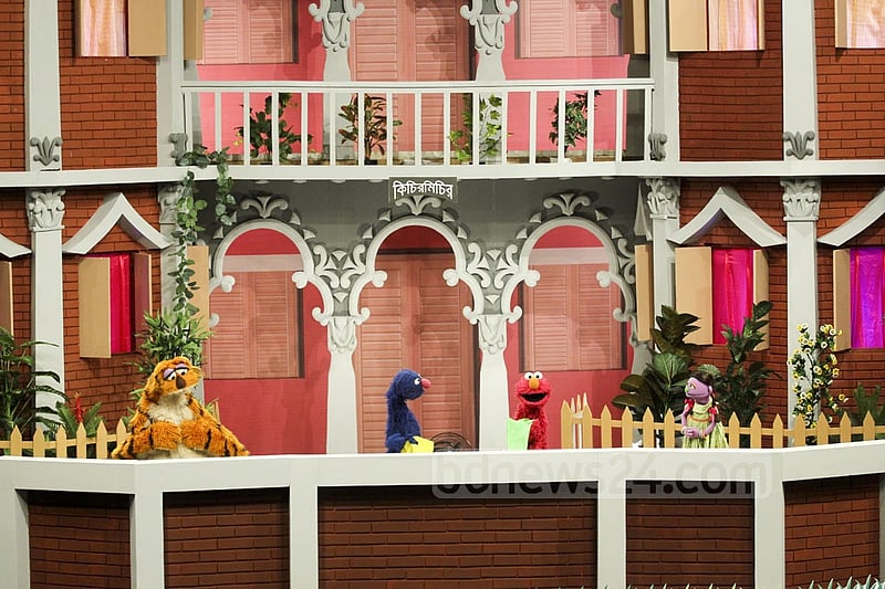 Puppetshow Sisimpur's 'Halum' and 'Tuktuki' with two other characters at the inauguration ceremony of a new project of the popular show on Wednesday. Photo: abdul mannan