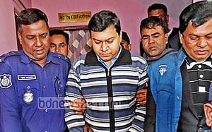 ঘুষের টাকাসহ ধরা পড়া কর কর্মকর্তা অভিজিৎ চাকরিচ্যুত