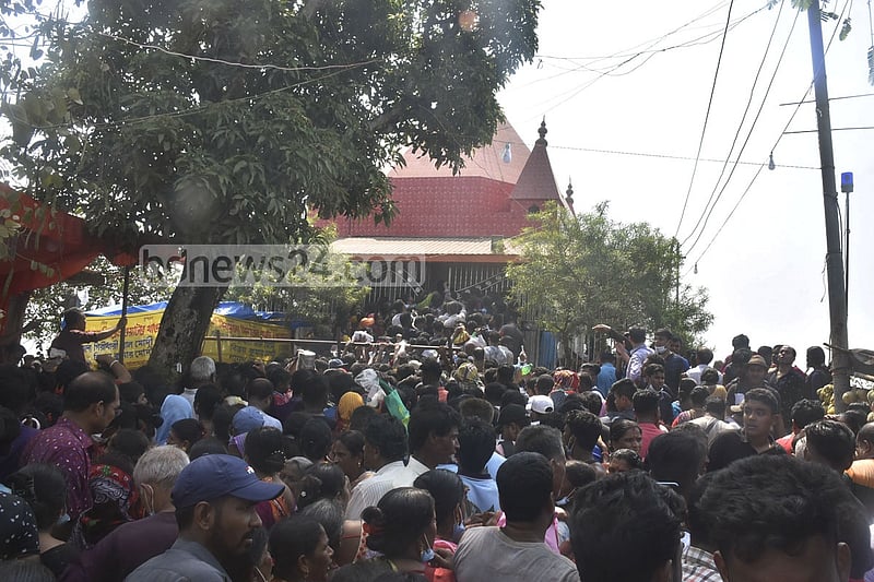 People pay no respect for health rules amid the coronavirus pandemic during Shiv Chaturdashi Mela at Chandranath Dham, a temple, in Chattogram’s Sitakunda on Thursday, Mar 11, 2021. Photo: Suman Babu