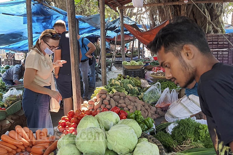 Russians working at a nuclear power plant in Pabna are busy shopping at a market in Rooppur. Photo: Reazul Bashar