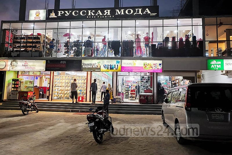 Ishwardi's Rooppur has transformed into a 'mini Russia' over the last few years. From shopping malls to small stalls, all the signboards are now written in Russian alongside Bangla and English. Photo: Habib Imran