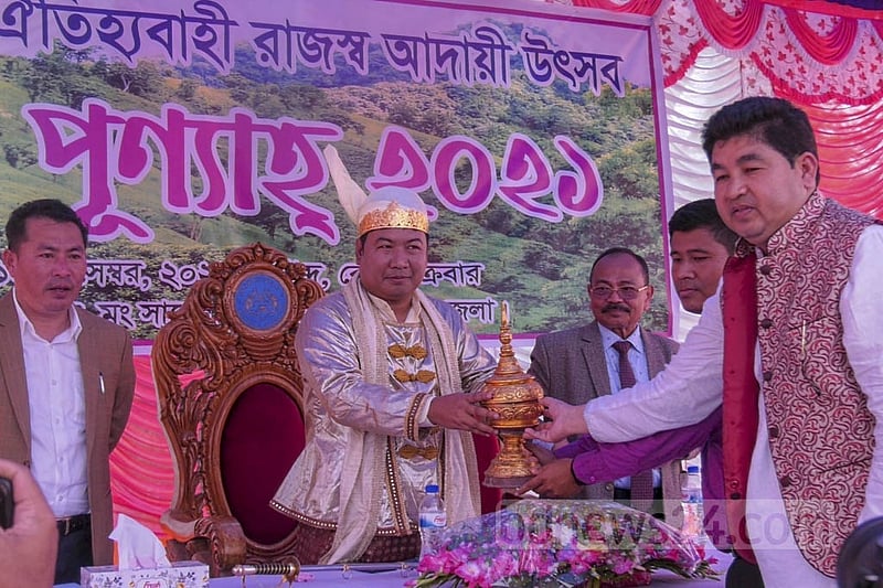 Mong Circle chief Raja Saching Prue Chowdhury is presented with traditional gifts on the occasion of Rajpunyah on Friday, Dec 10, 2021. Photo: Samir Mallik