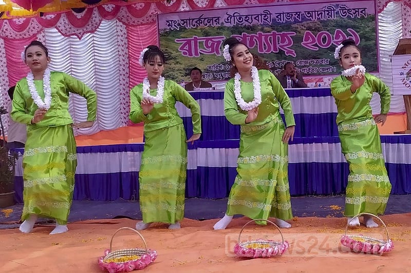 Khagrachhari’s small ethnic community presents traditional songs and dances on the occasion of Rajpunyah on Friday, Dec 10, 2021. Photo: Samir Mallik