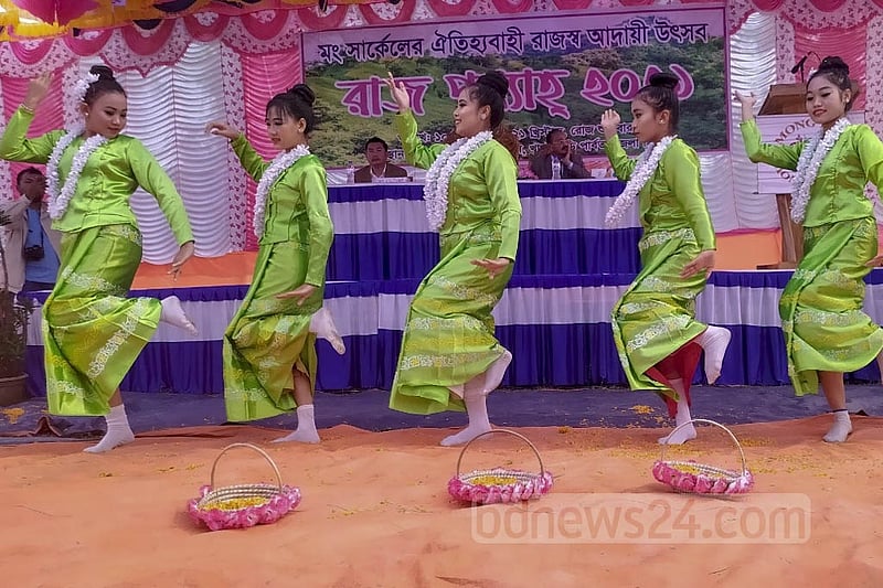 Khagrachhari’s small ethnic community presents traditional songs and dances on the occasion of Rajpunyah on Friday, Dec 10, 2021. Photo: Samir Mallik
