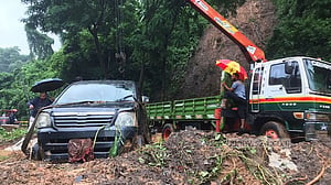চট্টগ্রামে পাহাড় ধসে রাস্তা বন্ধ, মাইক্রোবাস আটকা