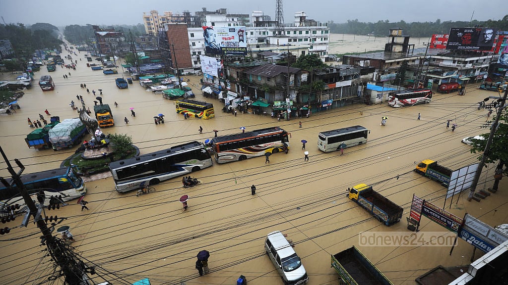 দোহাজারীতে বানের জলে ভেসে গেলেন দাদা-নাতি