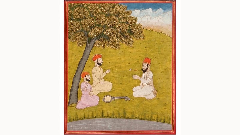 জন্মসাখি চিত্রকলায়, একটি গাছের ছায়ায় ভাগত কবীরের সঙ্গে সাক্ষাৎ করছেন গুরু নানক ও ভাই মারদানা, ছবি: উইকিমিডিয়া।