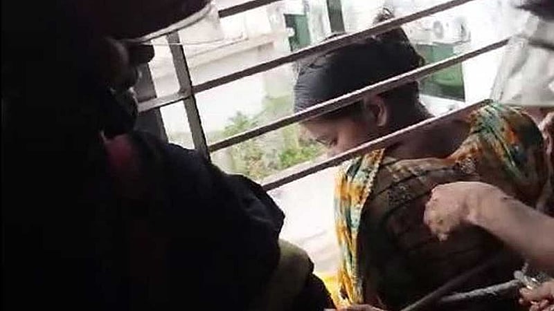 জানালার গ্রিল কেটে মেয়েটিকে উদ্ধার করেন ফায়ার সার্ভিসের কর্মীরা। 