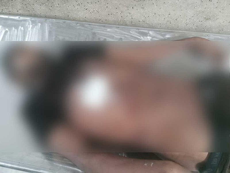 সাদ্দাম হোসেন সনুর মৃতদেহ।