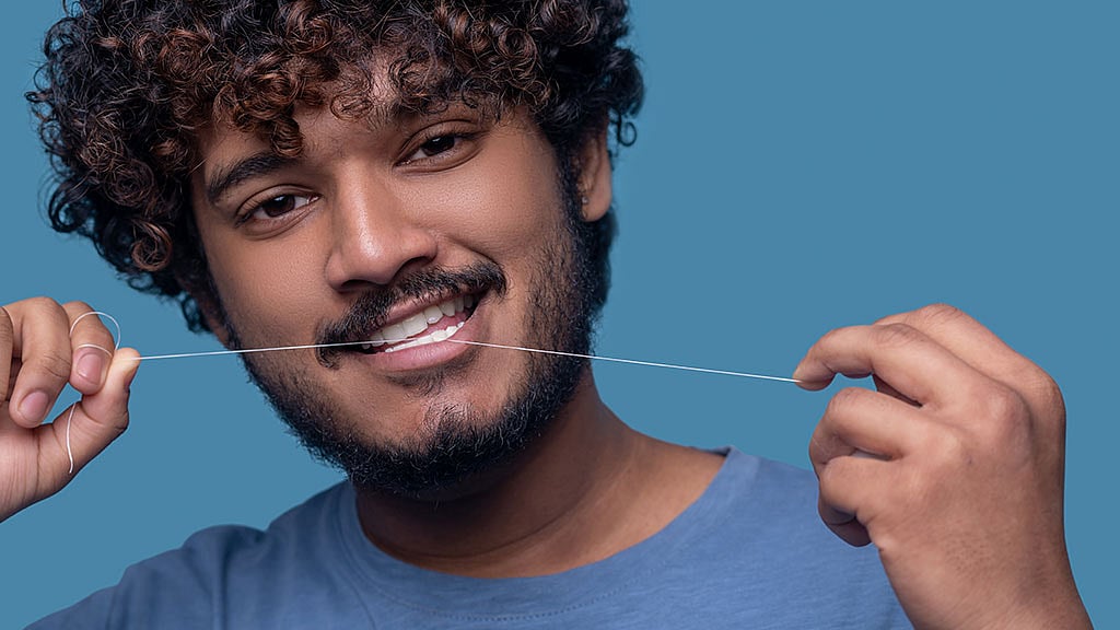 নিয়মিত ফ্লসিং করলে স্বাস্থ্যে যে প্রভাব পড়ে