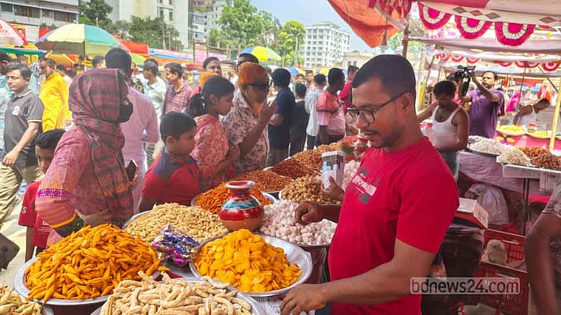 বৈশাখী মেলায় কদমা-বাতাসা খেয়ে শৈশবে ফেরা