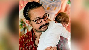 আমিরের কোলে শিশুটি কে