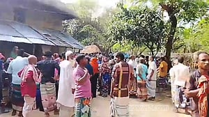 নওগাঁর নিয়ামতপুরে একই পরিবারের চারজনকে গলা কেটে হত্যা