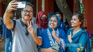 উৎসবমুখর ত্রয়োদশ নির্বাচন