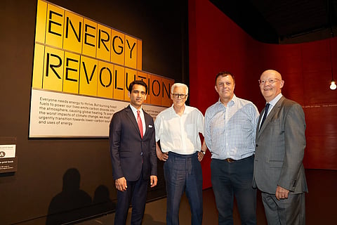 Infographic summarizing the Adani Green Energy Dialogue at London's Science Museum, highlighting BESS-led electrification with key figures including a 50 GW renewable target by 2030, 30 GW Khavda project, US$100+ billion investment commitment, and a 19.4 GW+ operating portfolio.