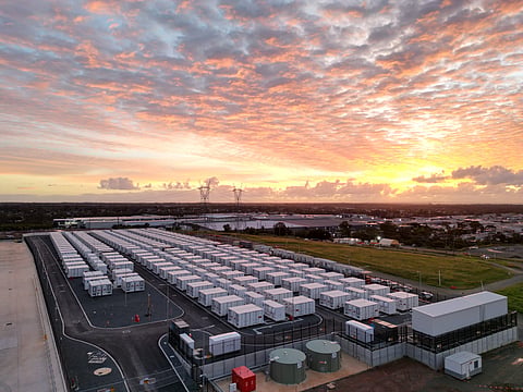 Quinbrook's Supernode battery energy storage project in Queensland, Australia, showing utility-scale battery containers and electrical infrastructure after Stage 2 entered commercial operation while Stage 3 secured financing for expansion.
