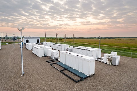 An AI-generated view of aligned containerised BESS units represents TINC and Infravest's €22 million investment in the 150 MW/410 MWh DSTOR and Estor-Lux II projects in Belgium.