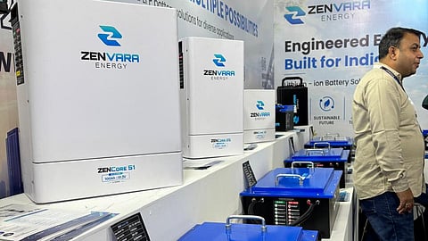 Zenvara Energy display at REI Expo 2026 with white ZenCore wall batteries and blue battery.