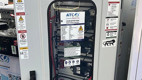 ATC 24 kWh battery rack in an open grey cabinet with its specification label.
