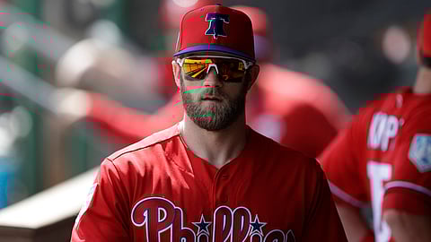 Bryce Harper walks the dugout in Clearwater earlier this spring (Chris O’Meara)