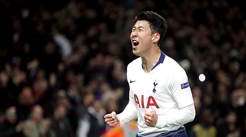 Tottenham Hotspur’s Son Heung-min will help lead his team against Huddersfield in early Saturday Premier League action. (Adam Davy/PA via AP)