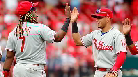 Phillies’ Maikel Franco (left) and Cesar Hernandez  celebrate a victory over the  Cardinals May 8 (Jeff Roberson)