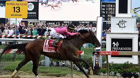War of Will, ridden by Tyler Gaffalione, crosses the finish line first to win the Preakness  at Pimlico Race Course, Saturday, May 18, 2019, in Baltimore. (AP Photo/Mike Stewart)
