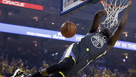 Golden State Warriors forward Draymond Green dunks against the Portland Trail Blazers during the first half of Game 2 of the NBA basketball playoffs Western Conference finals in Oakland, Calif., Thursday, May 16, 2019. (AP Photo/Jeff Chiu)