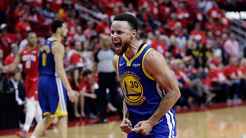 Golden State Warriors guard Stephen Curry (30) celebrates the team’s win over Houston in Game 6 of a second-round NBA basketball playoff series, Friday, May 10, 2019, in Houston. Golden State won 118-113, winning the series. (AP Photo/Eric Gay)