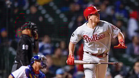 Philadelphia Phillies’ J.T. Realmuto watches his solo home run against the Chicago Cubs during the 10th inning of a baseball game on May 20, 2019.