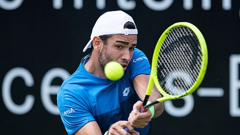 Italy’s Matteo Berrettini returns the ball during his final match against Canada’s Felix Auger-Aliassime at the ATP Tennis tournament in Stuttgart, Germany, June 16, 2019. (Silas Stein/dpa via AP)