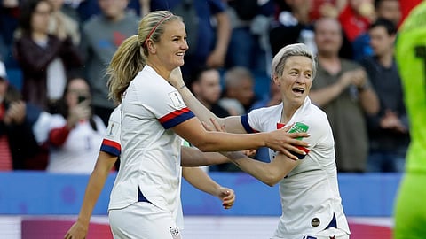 United States’ Lindsey Horan, left, is congratulated by teammate Megan Rapinoe, right, after scoring her team’s first goal during the Women’s World Cup Group F soccer match between Sweden and the United States at Stade Océane, in Le Havre, France, Thursday, June 20, 2019. (AP Photo/Alessandra Tarantino)