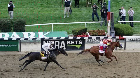 Justify, seen here winning the Belmont, had a $500,000 bitcoin bet on him to win the Kentucky Derby. He won, but it's still hard to justify.