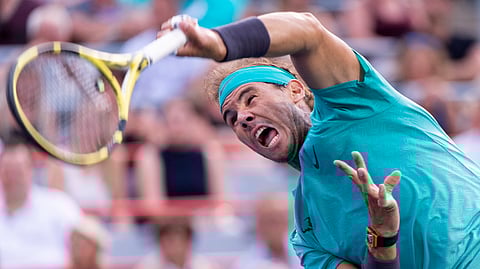 Rafael Nadal, of Spain, serves to Guido Pella, of Argentina, during the Rogers Cup men’s tennis tournament Thursday, Aug. 8, 2019, in Montreal. (Paul Chiasson/The Canadian Press via AP)