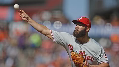 Philadelphia Phillies pitcher Jake Arrieta works against the San Francisco Giants in the first inning of a baseball game Sunday, Aug. 11, 2019, in San Francisco. (AP Photo/Ben Margot)
