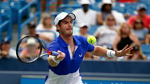 Andy Murray, of Britain, returns a shot against Richard Gasquet, of France, during first-round play at the Western & Southern Open tennis tournament Monday, Aug. 12, 2019, in Mason, Ohio. (AP Photo/Gary Landers)
