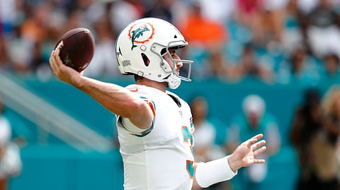Miami Dolphins quarterback Josh Rosen (3) looks to pass, during the second half at an NFL football game against the New England Patriots, Sunday, Sept. 15, 2019, in Miami Gardens, Fla. (AP Photo/Brynn Anderson)