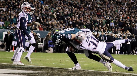 Eagles tight end Dallas Goedert heads into the end zone for a touchdown against the Patriots on Nov. 17 (Matt Rourke)