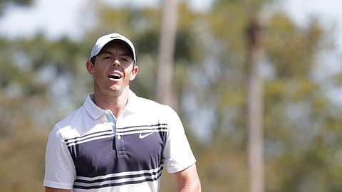 In this file photo dated Thursday, March 12, 2020, Rory McIlroy of Northern Ireland, reacts to a missed putt on the third hole, during the first round of The Players Championship golf tournament in Ponte Vedra Beach, USA. McIlroy is the favorite to win the Charles Schwab Challenge this year.