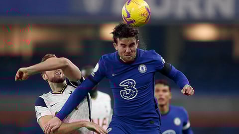 Chelsea's Ben Chilwell heads the ball next to Tottenham's Harry Kane, left, during the English Premier League soccer match between Chelsea and Tottenham Hotspur at Stamford Bridge in London, England, Sunday, Nov. 29, 2020. 