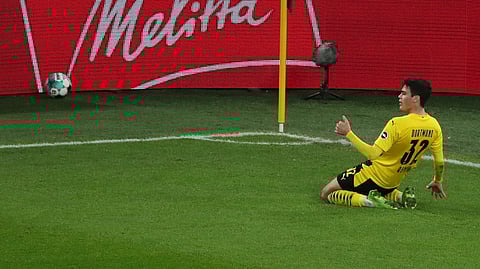 Dortmund's Giovanni Reyna celebrates during the German Bundesliga soccer match between Borussia Dortmund and VfB Stuttgart in Dortmund, Germany, Saturday, Dec. 12, 2020.