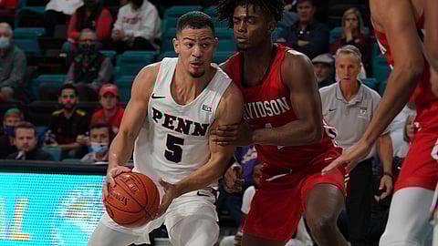 Penn's Jelani Williams drive on Davidson in Myrtle Beach. Today the Quakers travel to Towson St.