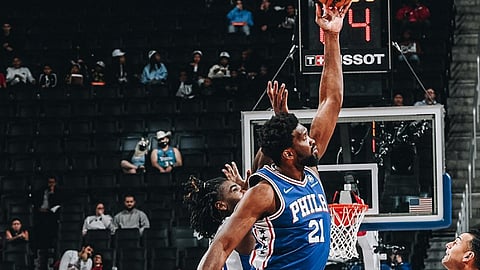 It's difficult to get Joel Embiid into a horizontal photo space.