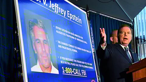 Geoffrey Berman, U.S. attorney for the Southern District of New York, speaks while standing next to a poster displaying the image of fund manager Jeffrey Epstein during a news conference in New York, U.S., on Monday, July 8, 2019. Epstein used his wealth and power to sexually abuse dozens of young girls for years at one of the biggest mansions in Manhattan, paying them hundreds of dollars in cash for each encounter and hundreds more if they brought in more victims, U.S. prosecutors said.