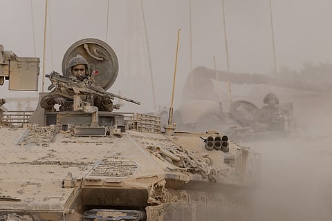 Israeli armored vehicles near the border with Gaza, in Southern Israel, on Sept. 7.