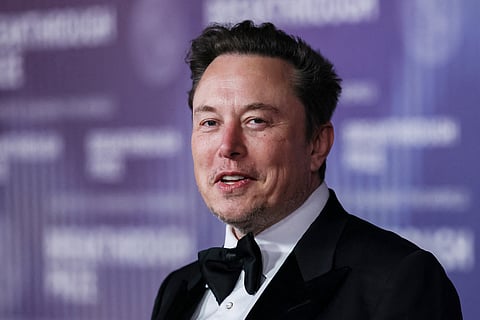 Elon Musk buys $1bn in Tesla stock, boosting shares amid pay proposal